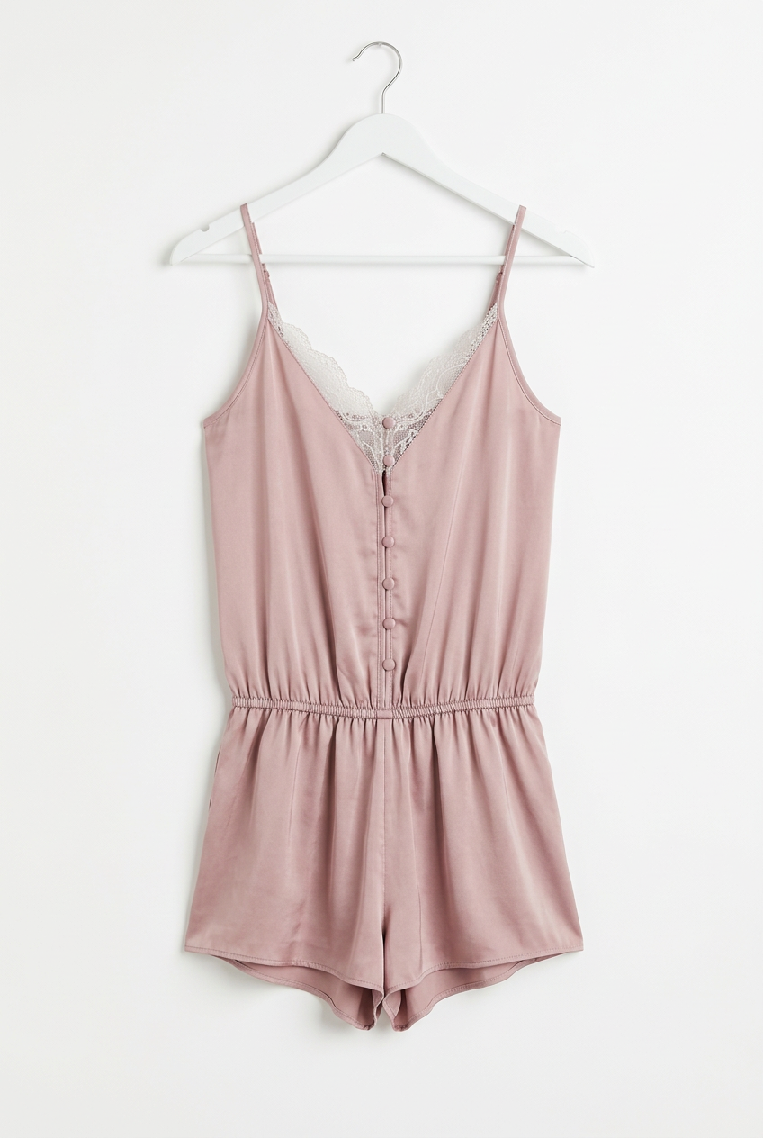 Blush satin lace-trim playsuit – hanger full length view, white background