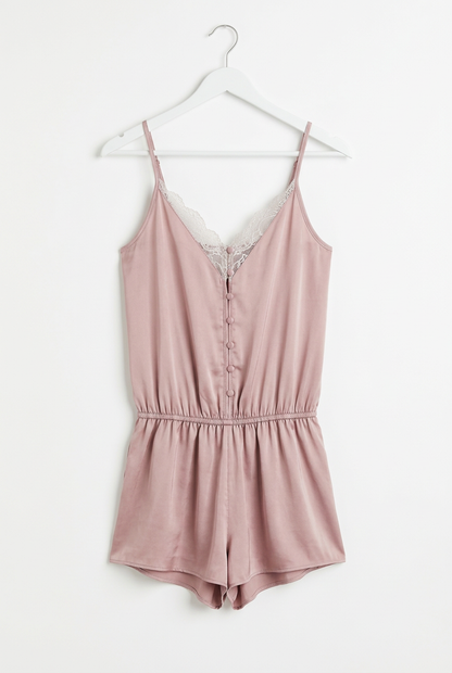 Blush satin lace-trim playsuit – hanger full length view, white background