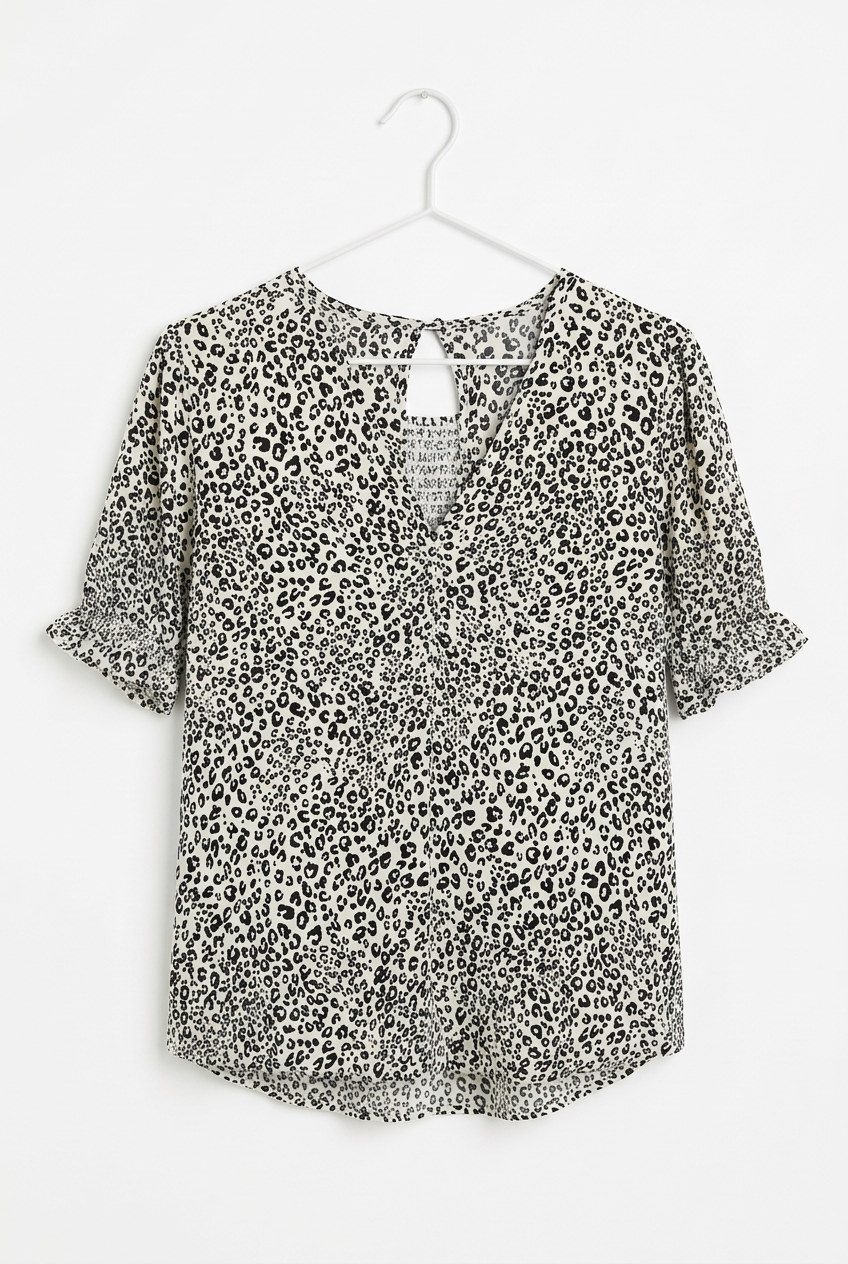 White leopard print blouse – hanger front view, white background