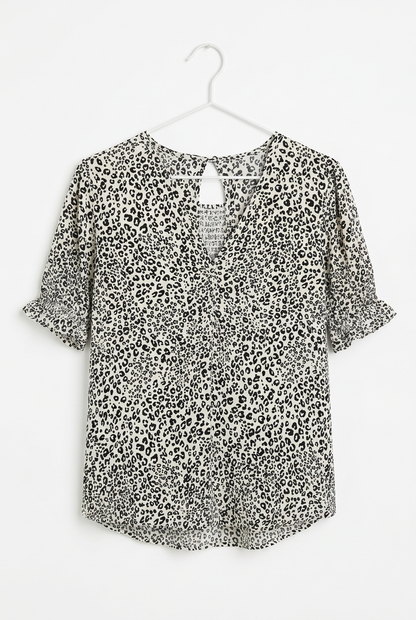 White leopard print blouse – hanger front view, white background