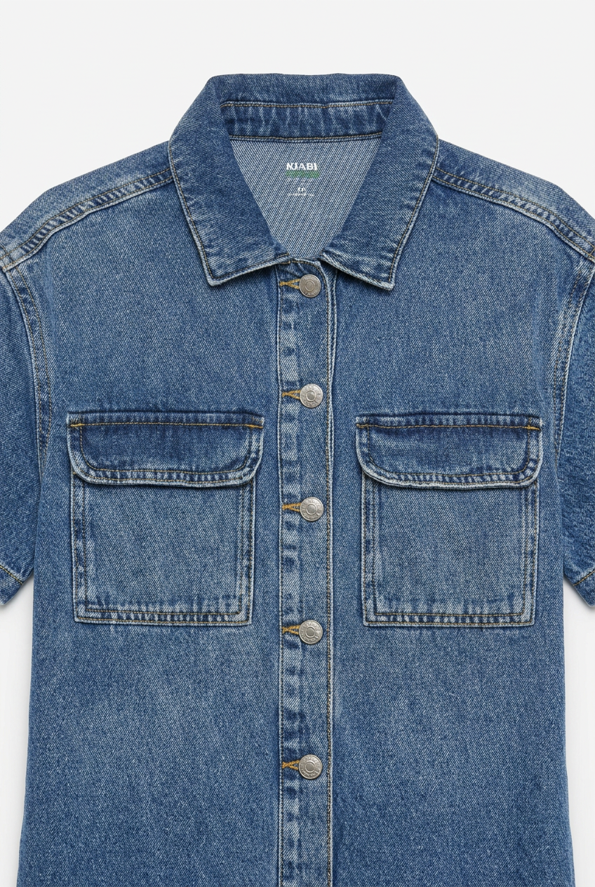 Denim playsuit – collar and chest pocket detail close-up, white background